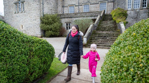 Visitors exploring the winter garden at Sizergh, Cumbria